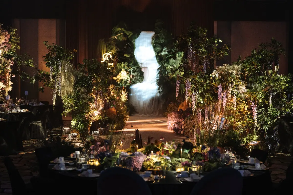 A floral archway framing the head of the room
